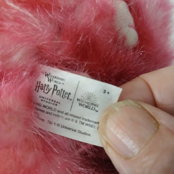 The Wizarding World of Harry Potter Pink Pigmy Round Plush - Picture 3 of 5